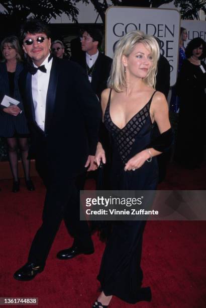 American guitarist Richie Sambora and his wife, American actress Heather Locklear attends the 54th Golden Globe Awards, held at the Beverly Hilton...