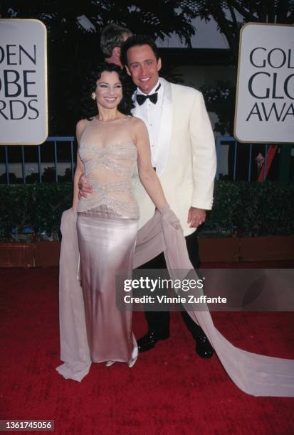 American actress and comedian Fran Drescher and husband, American actor Peter Marc Jacobson attend the 54th Golden Globe Awards, held at the Beverly...