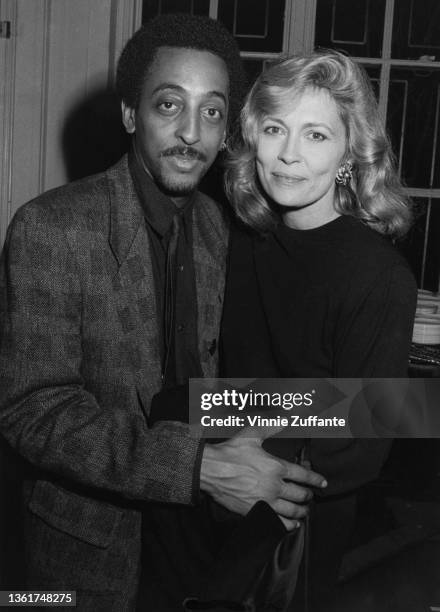 American actor, dancer, and choreographer Gregory Hines and American actress Faye Dunaway attend the after party that followed the New York premiere...