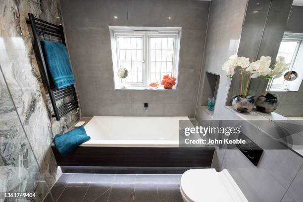 property interiors bathrooms - orchid order stock pictures, royalty-free photos & images