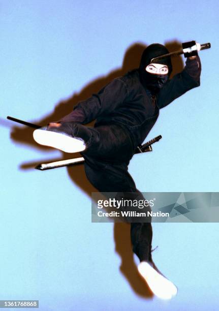 Japanese martial artist, actor, filmmaker and writer Sho Kosugi , does a ninja kick, on the set of "Pray for Death" circa 1985 in Los Angeles,...