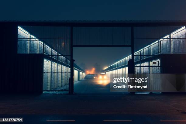 self storage units in a industrial area during twilight - self storage fotografías e imágenes de stock