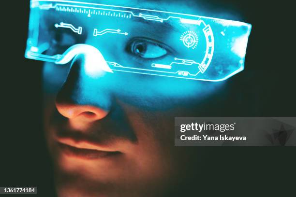 portrait of a handsome man in smart futuristic glasses - smart glasses stock pictures, royalty-free photos & images