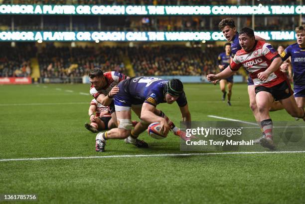 Justin Clegg of Worcester Warriors scoring their first try during the Premiership Rugby Cup match between Worcester Warriors and Gloucester Rugby at...