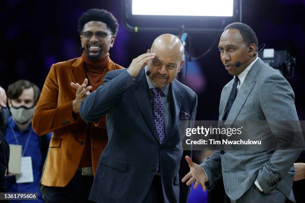 Jalen Rose, Michael Wilbon and Stephen A. Smith of ESPN look on during a game between the Philadelphia 76ers and the Golden State Warriors at Wells...