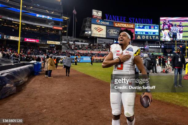 Taulia Tagovailoa of the Maryland Terrapins celebrates during the fourth quarter of the New Era Pinstripe Bowl against the Virginia Tech Hokies at...