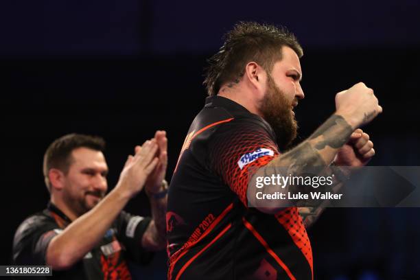 Michael Smith of Englands reacts to the win during his Fourth Round Match against Jonny Clayton of Wales during Day Twelve of The William Hill World...