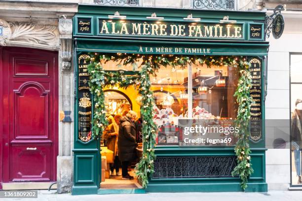 chocolate factory facade - paris christmas stock pictures, royalty-free photos & images