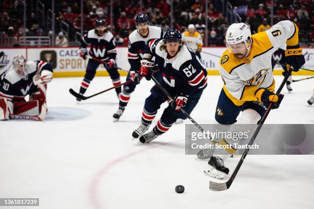 Filip Forsberg of the Nashville Predators handles the puck against the Washington Capitals during the first period of the game at Capital One Arena...
