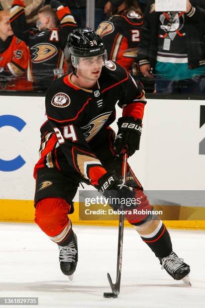 Jamie Drysdale of the Anaheim Ducks skates with the puck during warm ups prior to the game against the Vancouver Canucks at Honda Center on December...