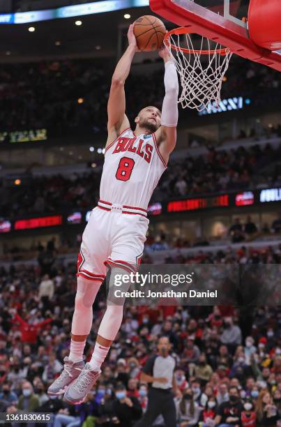 Zach LaVine of the Chicago Bulls dunks against the Atlanta Hawks at the United Center on December 29, 2021 in Chicago, Illinois. The Bulls defeated...