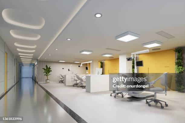 interior of open plan dental clinic with dentist chairs, dental tools, yellow cabinets and plants. - dentists office bildbanksfoton och bilder