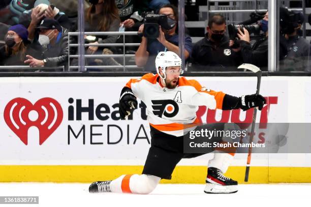 Ivan Provorov of the Philadelphia Flyers celebrates his game-winning goal in overtime against the Seattle Kraken at Climate Pledge Arena on December...