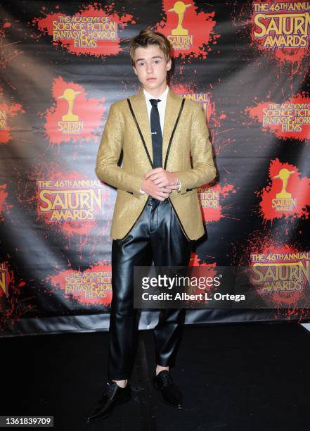 Maxwell Jenkins poses inside the Press Room at The 46th Annual Saturn Awards held at Los Angeles Marriott Burbank Airport on October 26, 2021 in...