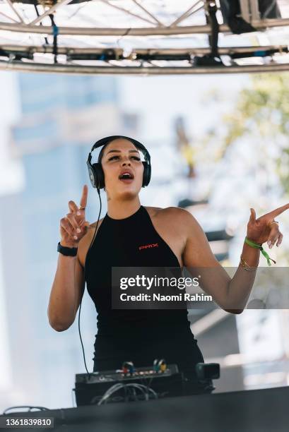 Professional basketball player and DJ Elizabeth Cambage performs during Beyond The City at Sidney Myer Music Bowl on December 30, 2021 in Melbourne,...