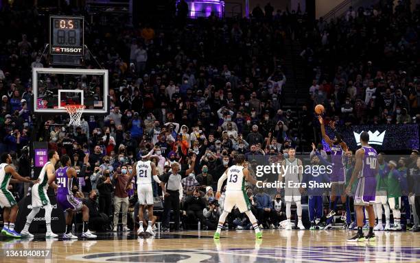 Chimezie Metu of the Sacramento Kings makes a three-point basket at the buzzer to beat the Dallas Mavericks by one point at Golden 1 Center on...