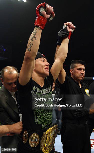 Cristiane "Cyborg" Santos reacts after knocking out Hiroko Yamanaka during the Strikeforce event at the Valley View Casino Center on December 17,...