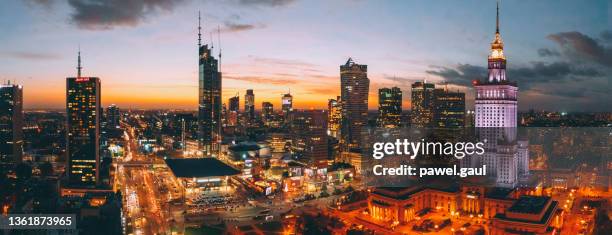 aerial view of warsaw downtown by night - warsaw stock pictures, royalty-free photos & images