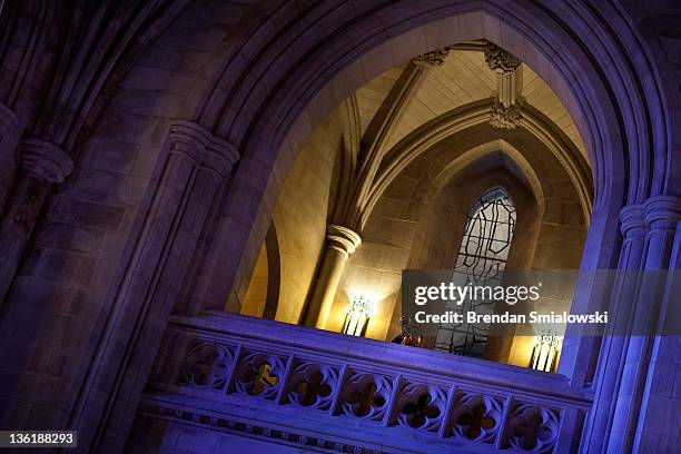 Soldier plays Taps during a wreath laying at the National Cathedral December 28, 2011 in Washington, DC. A wreath was placed at the tomb of the 28th...