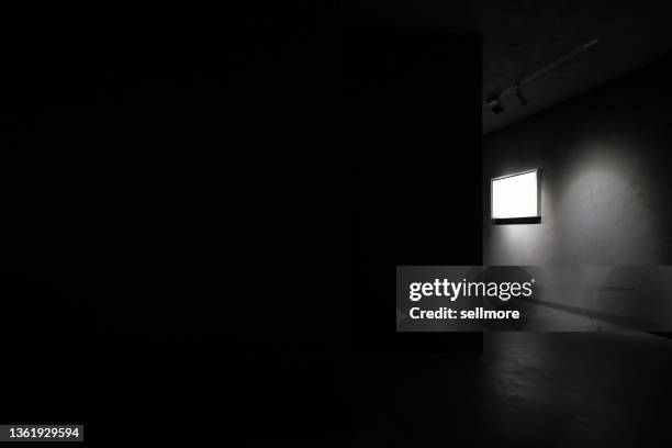 a picture frame in a dark room - poster size stock pictures, royalty-free photos & images