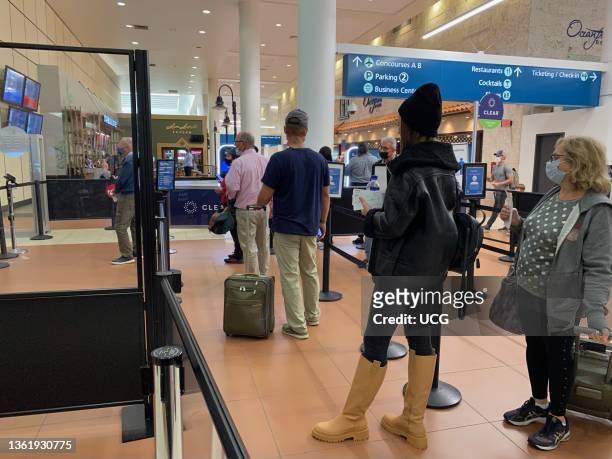 Passengers lined up at TSA security area, West Palm Beach, Florida.