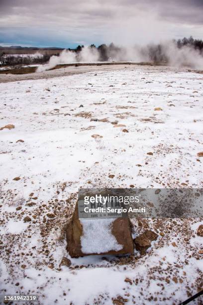 danger sign by geysir - strokkur stock pictures, royalty-free photos & images