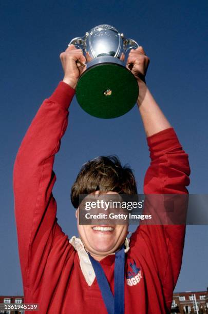 Victorious USA player Patricia 'Patty' Jervey holds aloft the Womens Rugby Union World Cup Trophy after their victory in the Final against England...