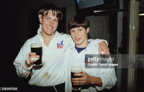 Victorious USA players celebrate with a pint of Guinness each after the Womens Rugby Union World Cup Semi-Final victory against New Zealand played at...