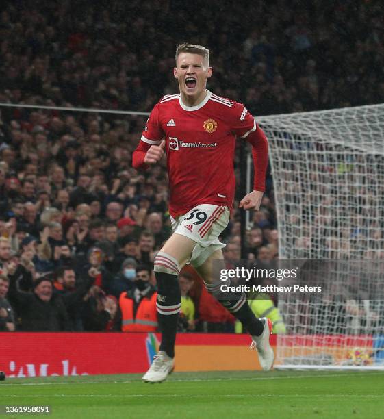 Scott McTominay of Manchester United celebrates scoring their first goal during the Premier League match between Manchester United and Burnley at Old...