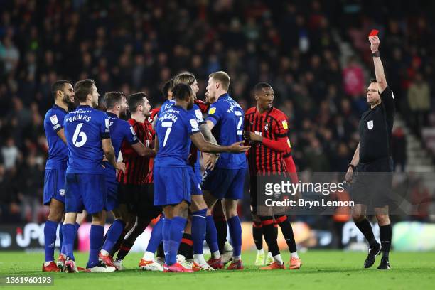 Leandro Bacuna of Cardiff City is shown a red card from referee James Linington during the Sky Bet Championship match between AFC Bournemouth and...