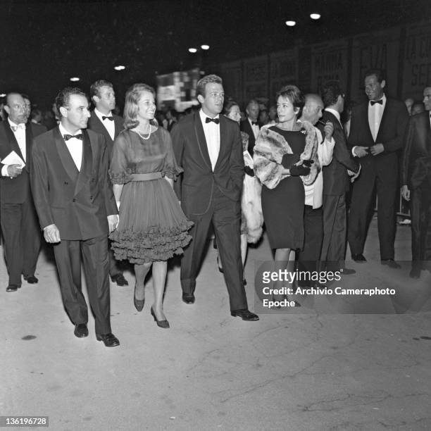 French actress Annie Girardot at the Venice Festival with her husband Renato Salvatori, Venice, 1962.