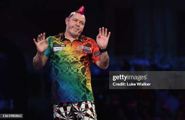 Peter Wright of Scotland reacts to the win during his Fourth Round Match against Ryan Searle of England during Day Thirteen of The William Hill World...