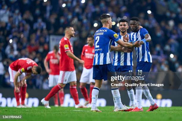 Fabio Cardoso , Jesus Corona and Chancel Mbemba of FC Porto celebrate the victory at the end of the Liga Portugal Bwin match between FC Porto and SL...