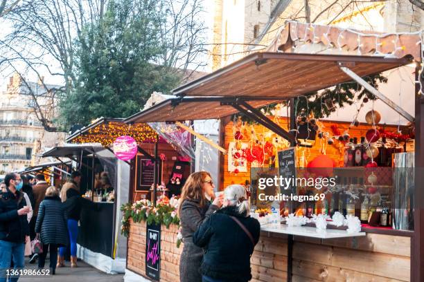 chalet in christmas market - catholic church christmas stock pictures, royalty-free photos & images