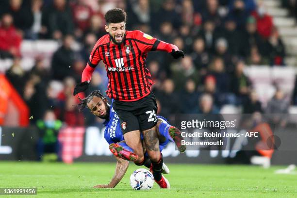 Leandro Bacuna of Cardiff City makes a wild lunge on Philip Billing of Bournemouth and is sent off during the Sky Bet Championship match between AFC...