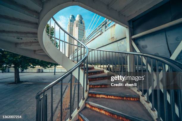 the spiral staircase of the viaduct - spiral staircase stock pictures, royalty-free photos & images