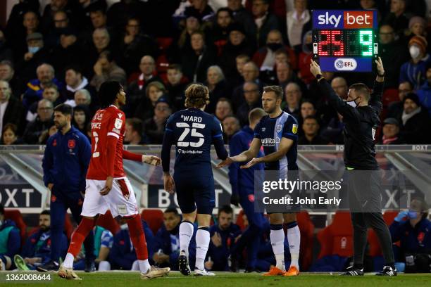 Danny Ward of Huddersfield Town comes off after feeling ill and is replaced by substitute Jordan Rhodes during the Sky Bet Championship match between...