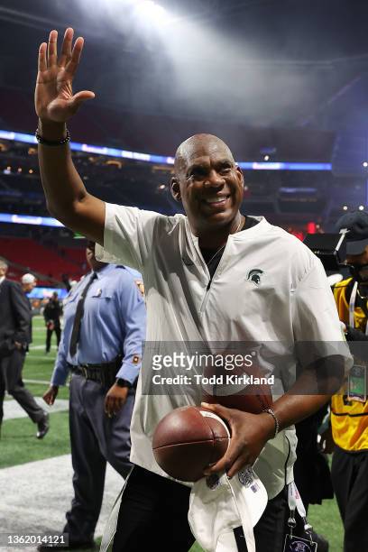 Head coach Mel Tucker of the Michigan State Spartans celebrates after defeating the Pittsburgh Panthers in the Chick-Fil-A Peach Bowl at...