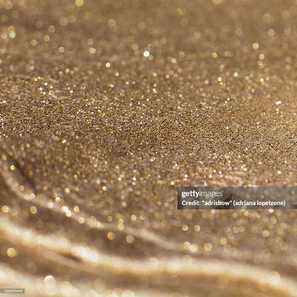 Bokeh of gold glitter square texture