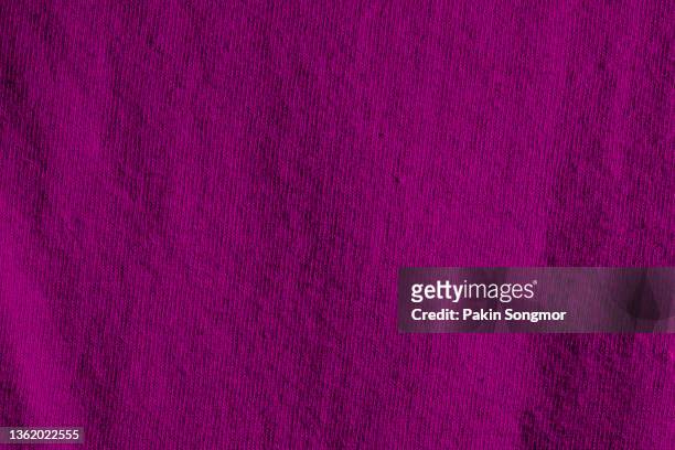 dark magenta fabric cloth polyester texture and textile background. - pink jersey stock-fotos und bilder