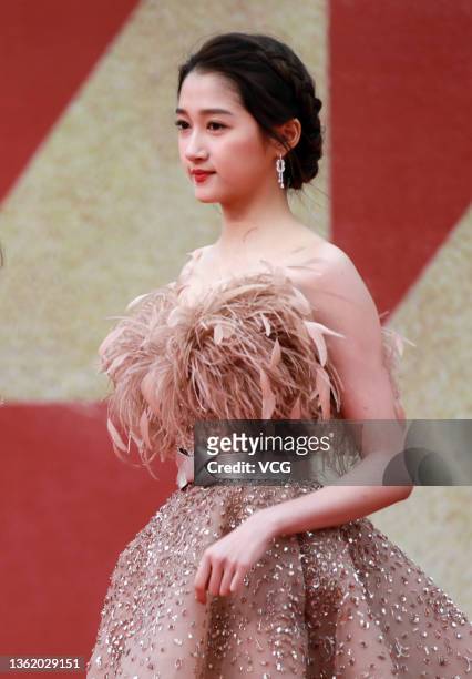 Actress Guan Xiaotong attends the closing ceremony of the 30th China Golden Rooster and Hundred Flowers Film Festival on December 30, 2021 in Xiamen,...