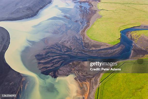 aerial view of river estuary or delta,iceland - delta stockfoto's en -beelden