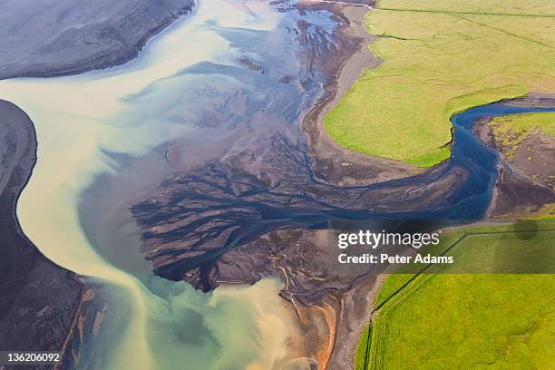 aerial view of river estuary or delta,iceland - estuary stock pictures, royalty-free photos & images