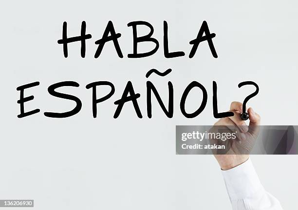 writing "habla espanol?" - spanish language stockfoto's en -beelden