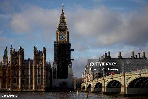 The eastern face of Elizabeth Tower is seen at midday on December 31, 2021 in London, England. The Elizabeth Tower is part of the Houses of...