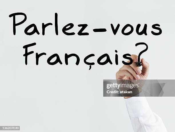 writing do you speak french? - franse cultuur stockfoto's en -beelden