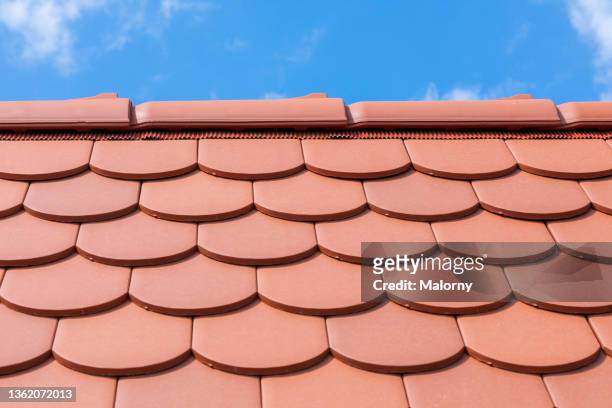 close-up of roof tiles. - tile roof stock pictures, royalty-free photos & images