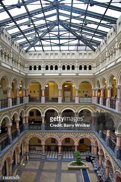interior of atrium with columns on many floors - rochester new york state foto e immagini stock