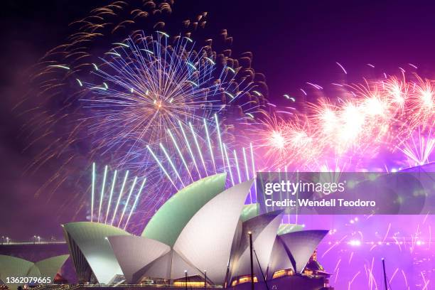 Fireworks are seen over the Sydney Opera House during New Year's Eve celebrations on January 01, 2022 in Sydney, Australia. New Year's Eve...