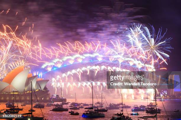 Fireworks are seen over Sydney harbour during New Year's Eve celebrations on January 01, 2022 in Sydney, Australia. New Year's Eve celebrations...